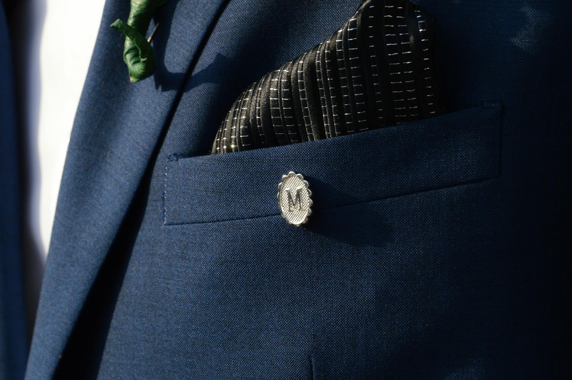 Silver-colored M Lapel Pin