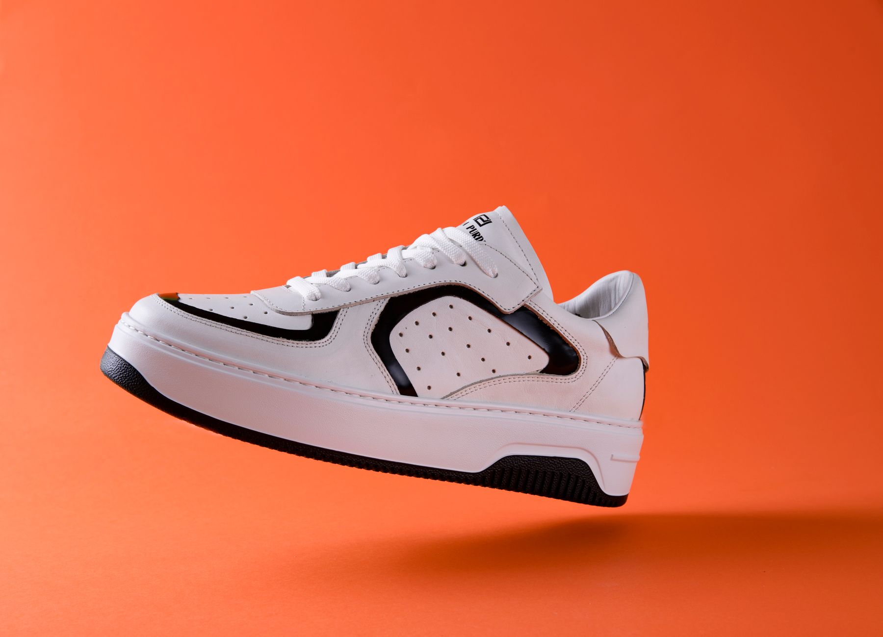 White and black Nightshift Runner profile