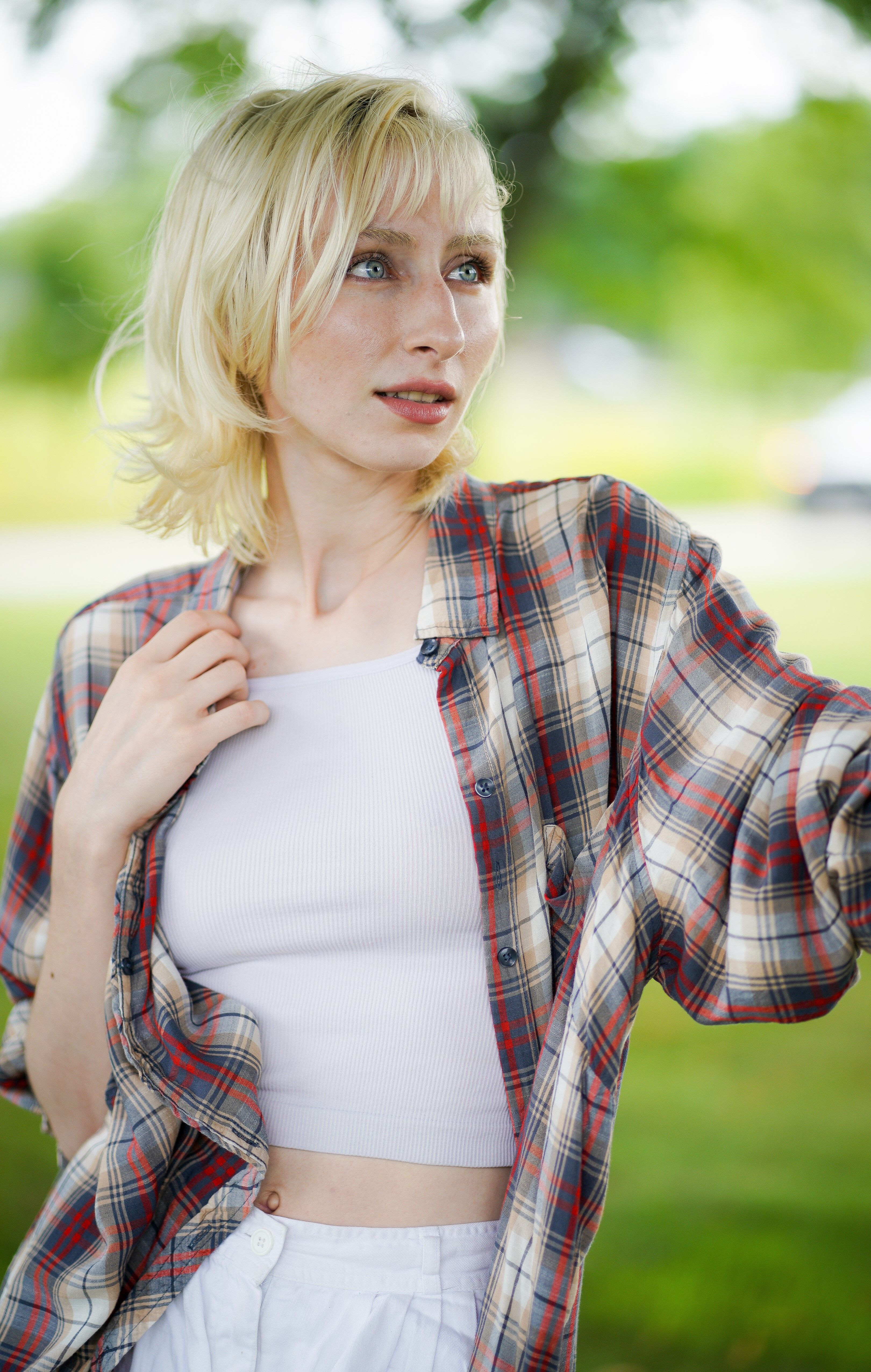 Young Woman Outdoors in Casual Attire · Free Stock Photo