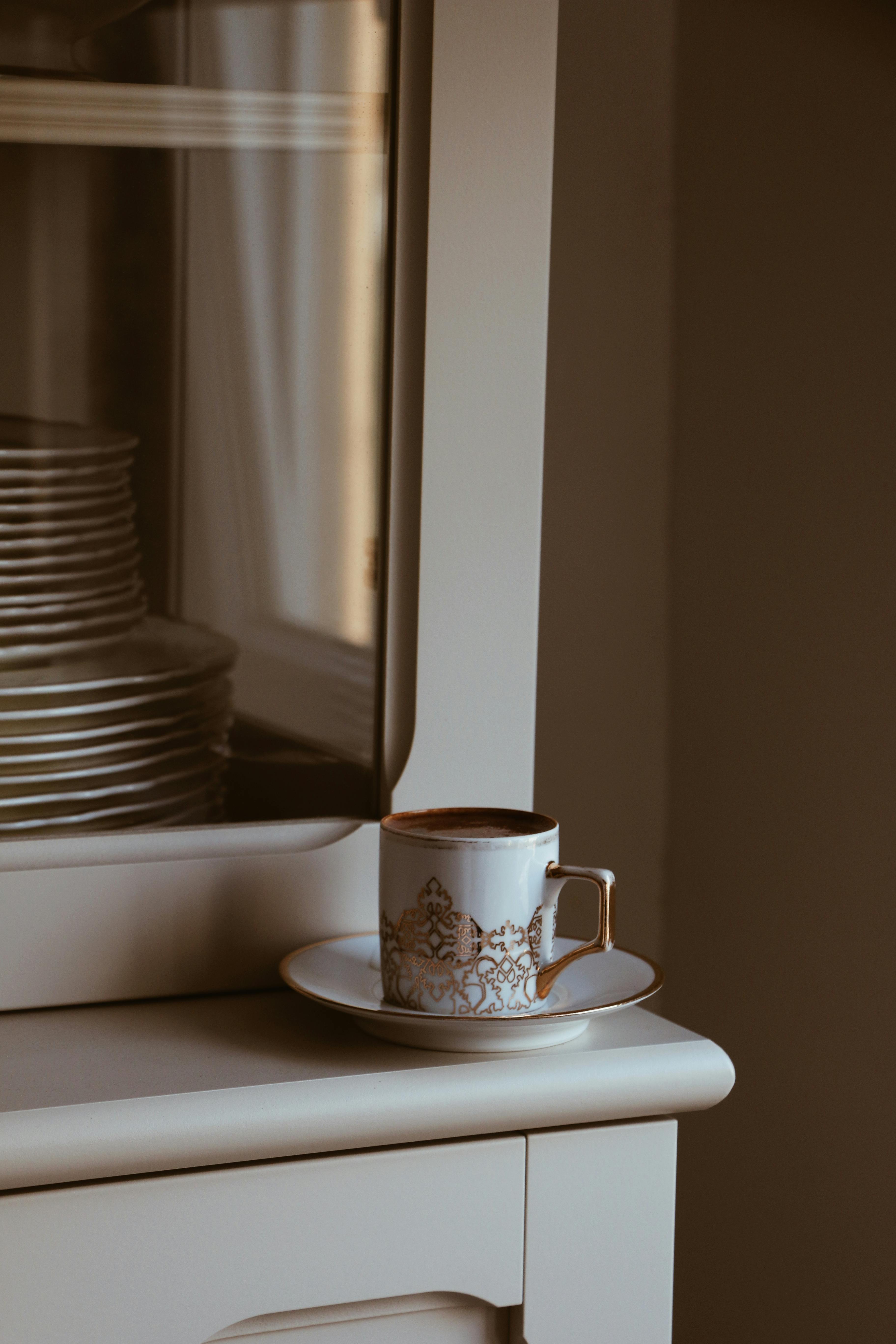 elegant teacup on vintage cabinet