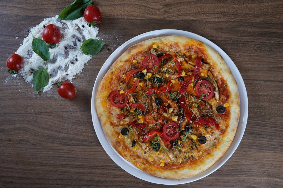 Homemade Neapolitan pizza with fresh ingredients on a wooden table in Istanbul.