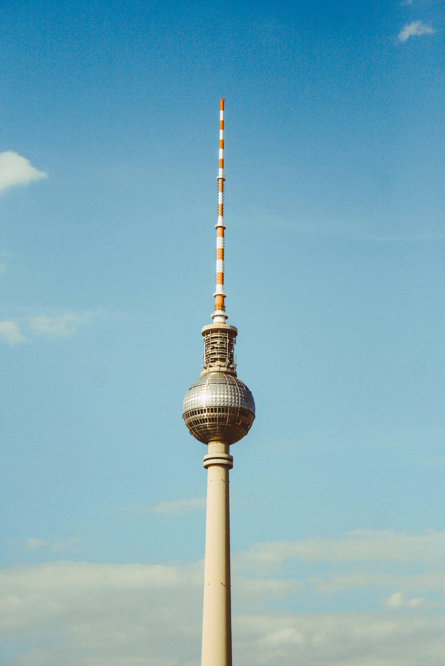 Berliner Fernsehturm Tower In Berlin Germany Under Blue And White Skies Free Stock Photo