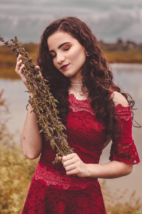 Free Photo Of Woman Holding Dried Plant Stock Photo