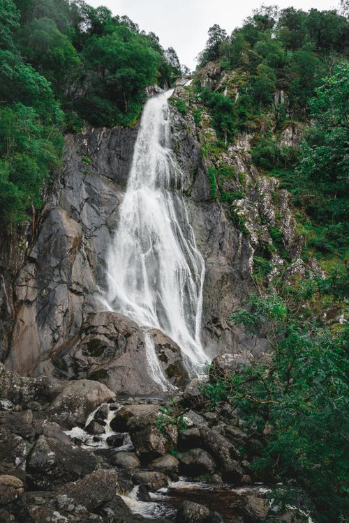 Free Majestic waterfall cascading in Abergwyngregyn, showcasing nature's beauty in Wales. Stock Photo