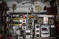 A collection of vintage electronics and antiques in an Algerian shop.