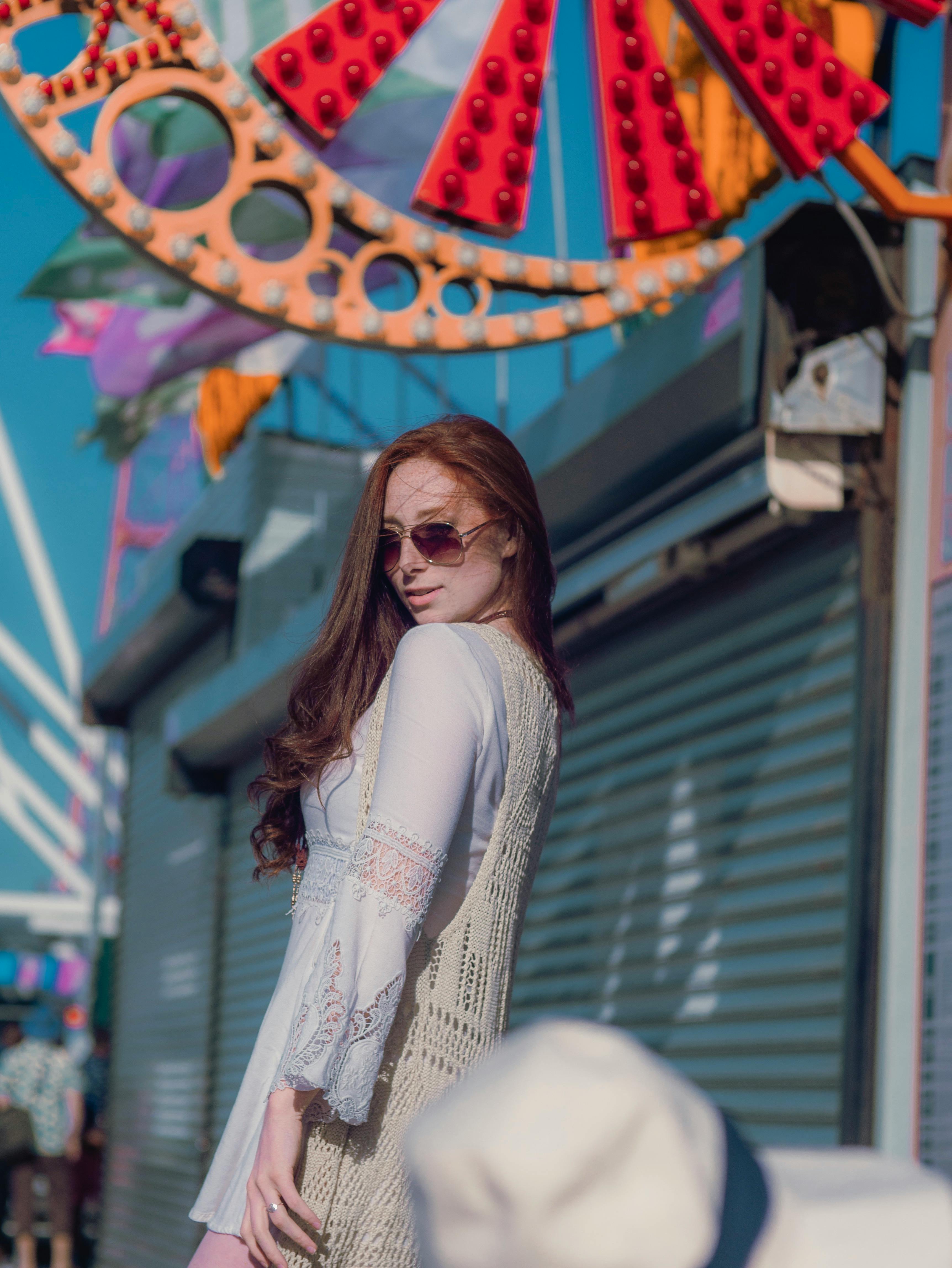 photo of woman wearing white dress