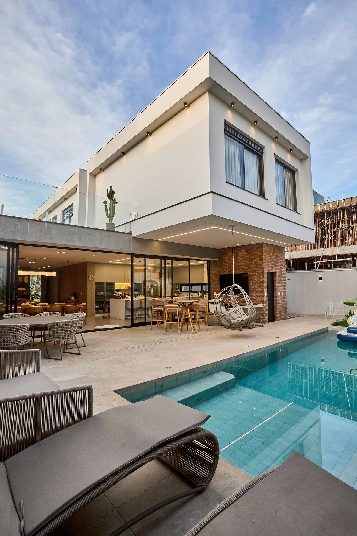 Paradise Valley style modern luxury home with poolside glass and desert light