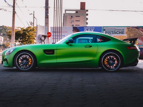 A sleek green Mercedes sports car parked at a filling station in urban Brazil.