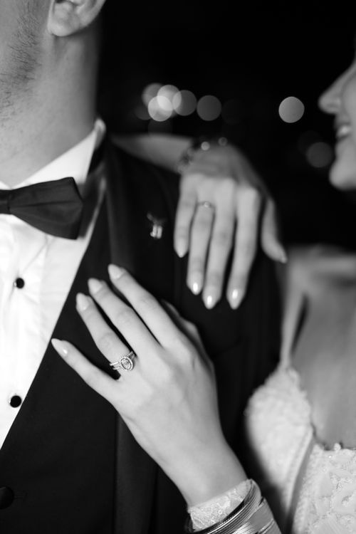 Free Close-up of a couple embracing on their wedding day, in black and white. Stock Photo
