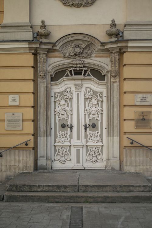 Free Intricately designed historical door on a building in Wrocław, Poland. Stock Photo
