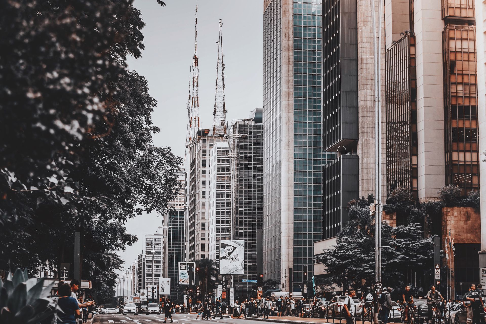 Dynamic urban scene capturing skyscrapers and bustling city life in Campinas, Brazil.