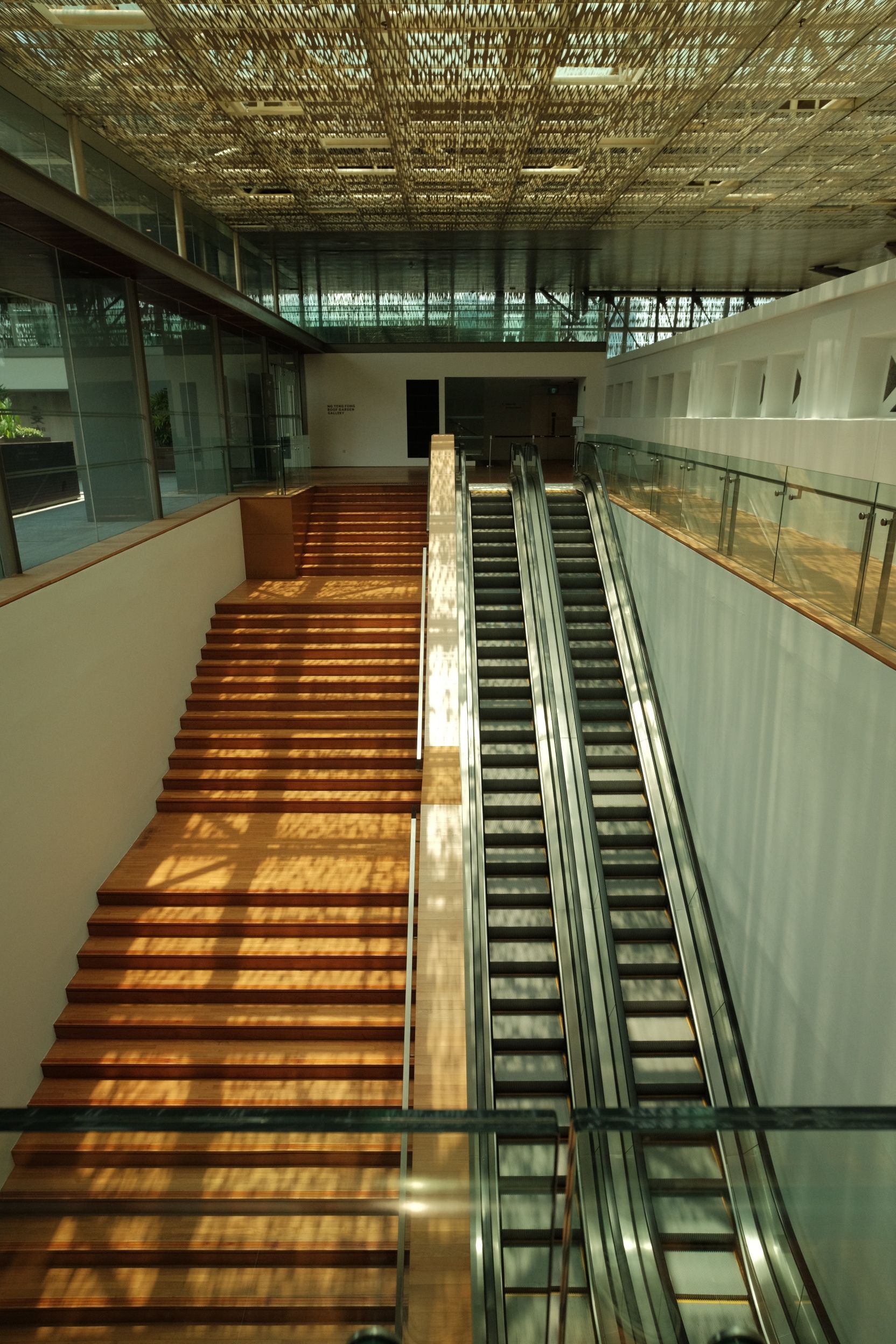 Modern Indoor Architecture with Escalators and Stairs · Free Stock Photo