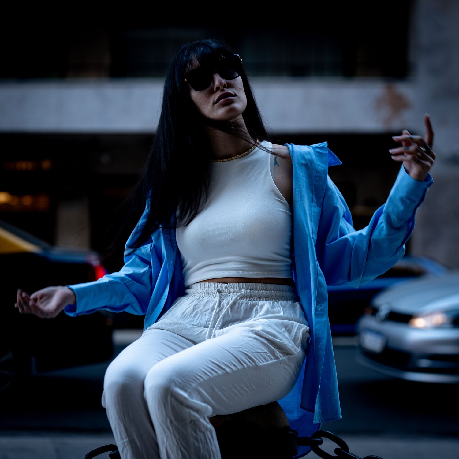 Stylish Woman Posing Outdoors in Urban Setting · Free Stock Photo