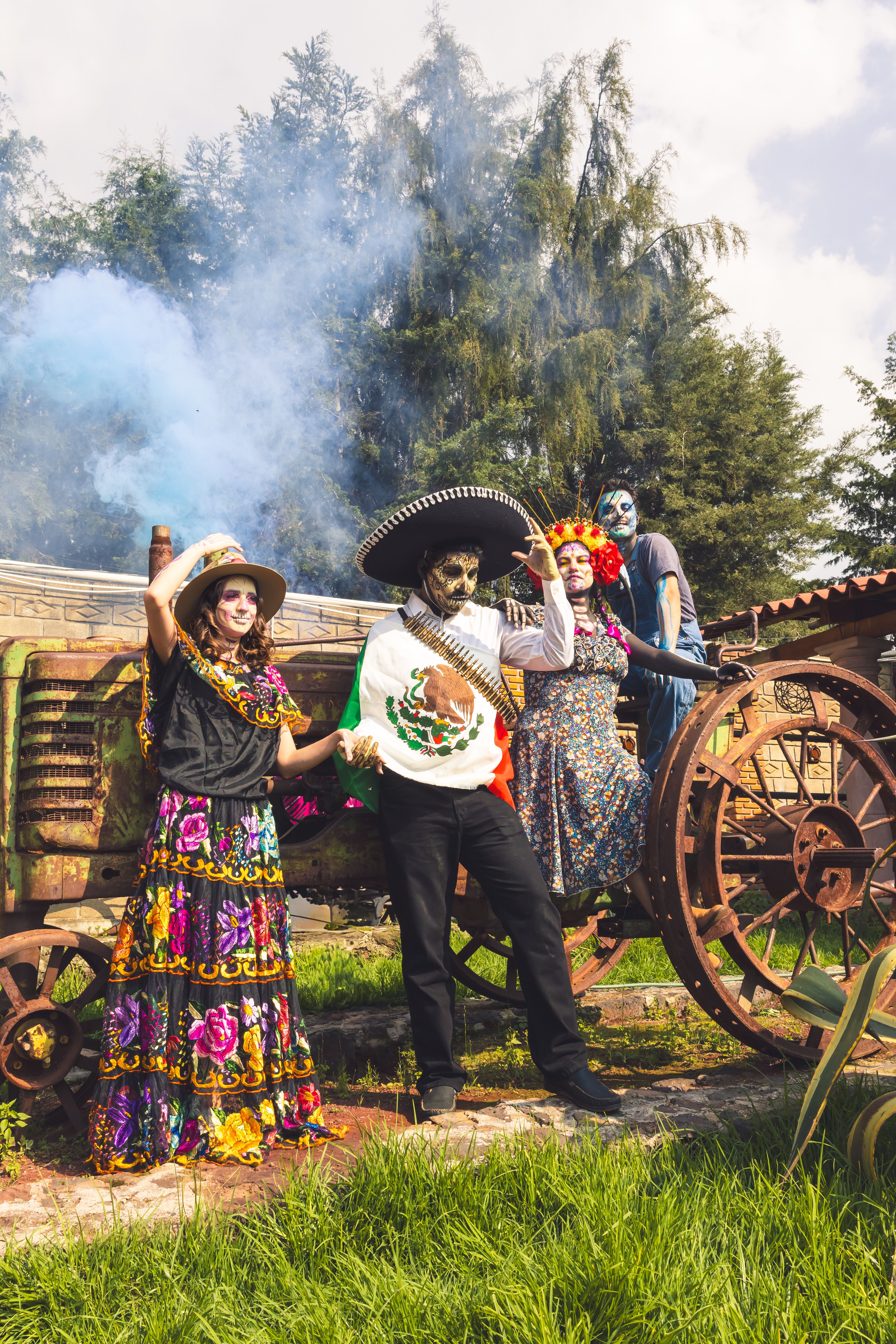 Colorful Day of the Dead celebration with costumes and makeup in CDMX, Mexico.