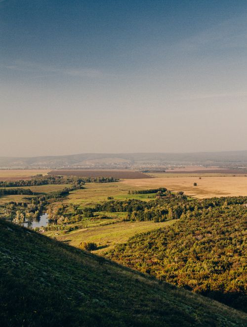 Free Beautiful aerial view of autumn landscape in Bashkortostan, Russia with lush forests and rolling hills. Stock Photo
