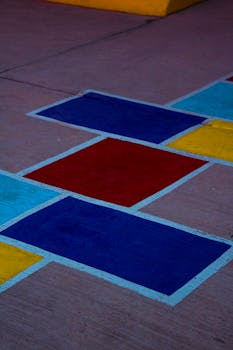 Bright pavement art of hopscotch in Santiago de Querétaro, México.