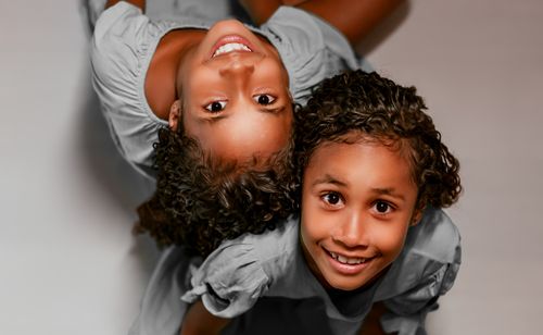 Free Two young girls sharing a joyful sisterly bond in Pedro do Rosário, Brazil. Stock Photo