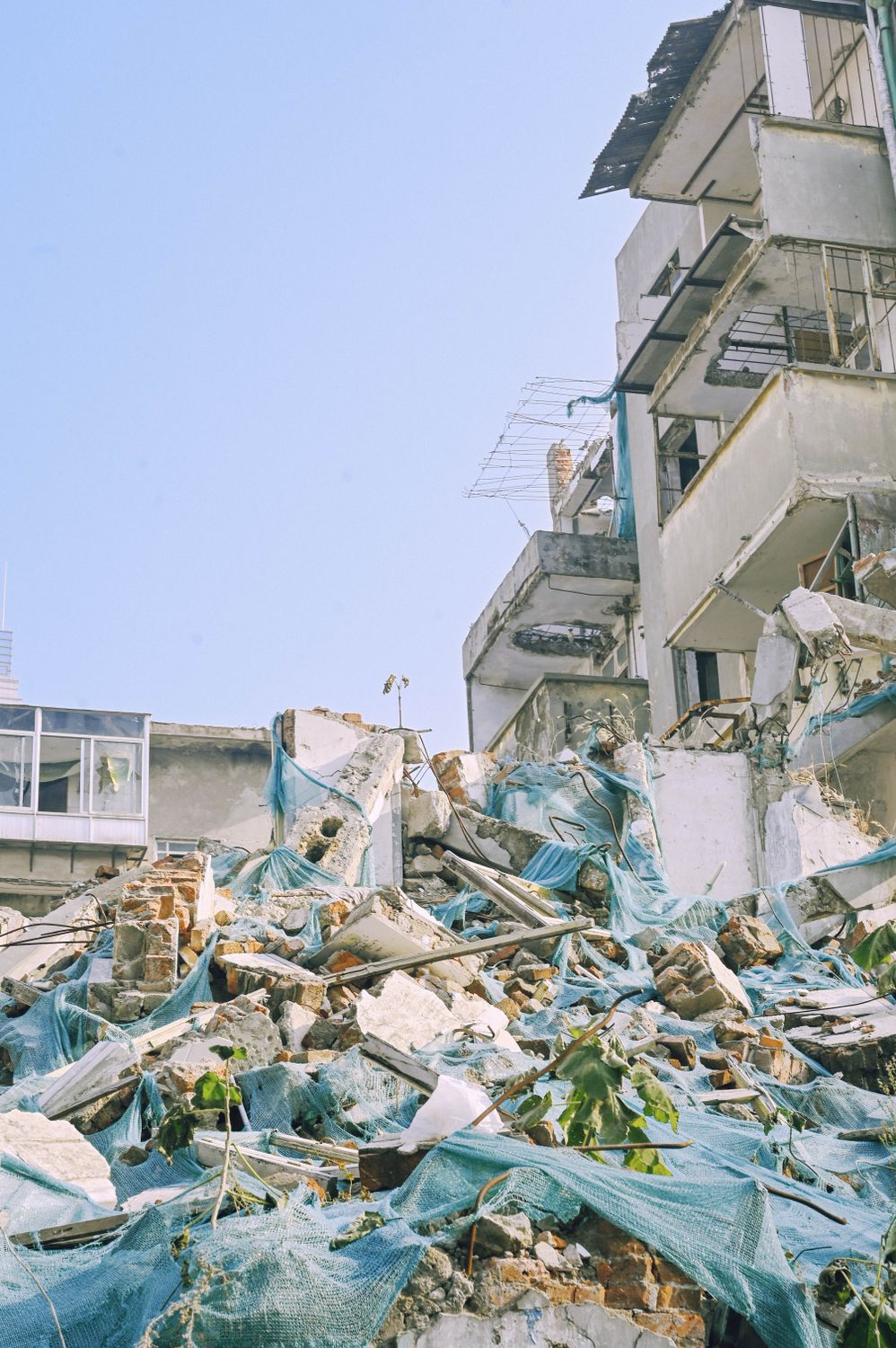 Demolished urban building with rubble and debris from construction dismantling