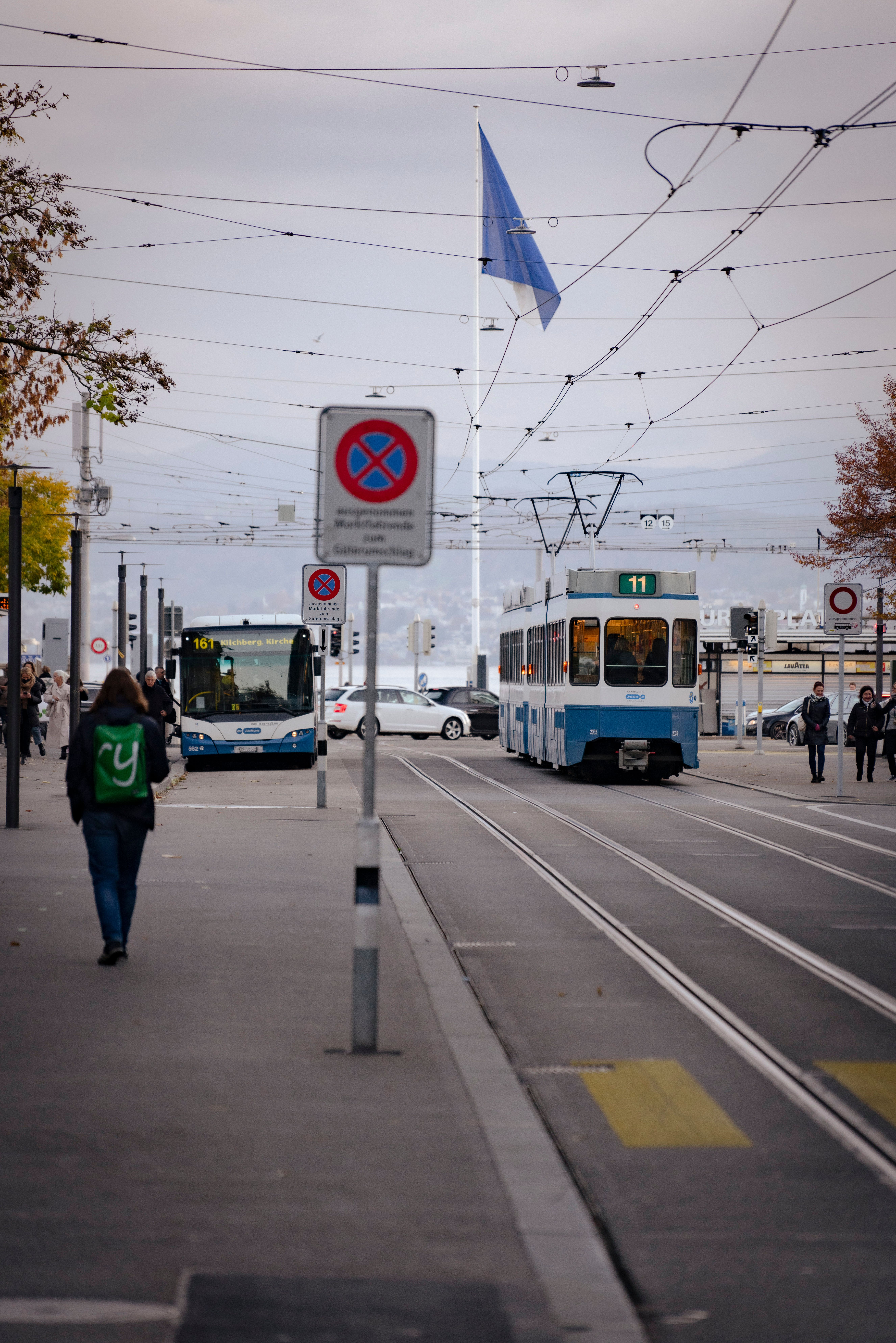 Tram and Bus on a Busy Urban Street in Europe · Free Stock Photo