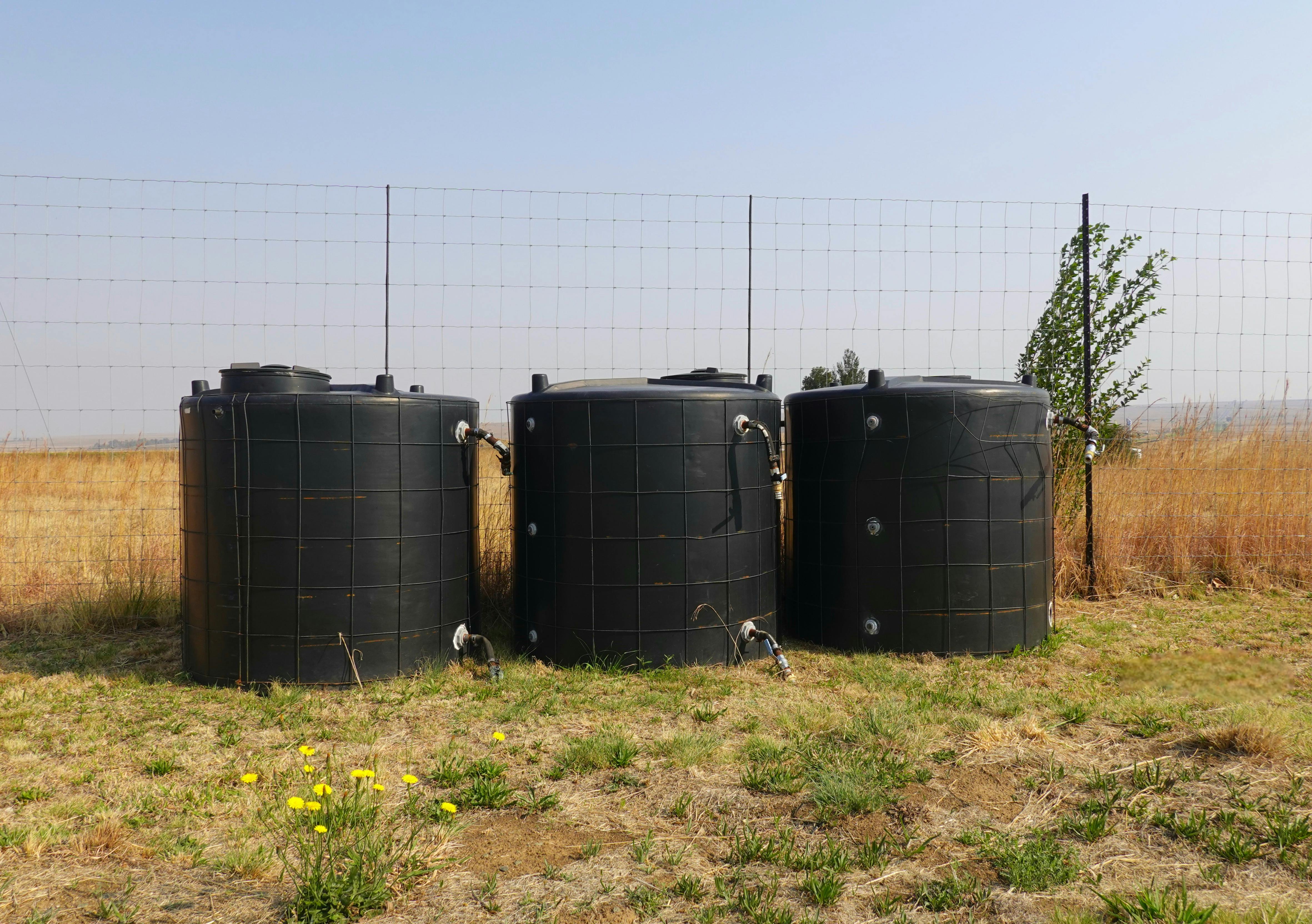 Outdoor Water Storage Tanks in Arid Landscape