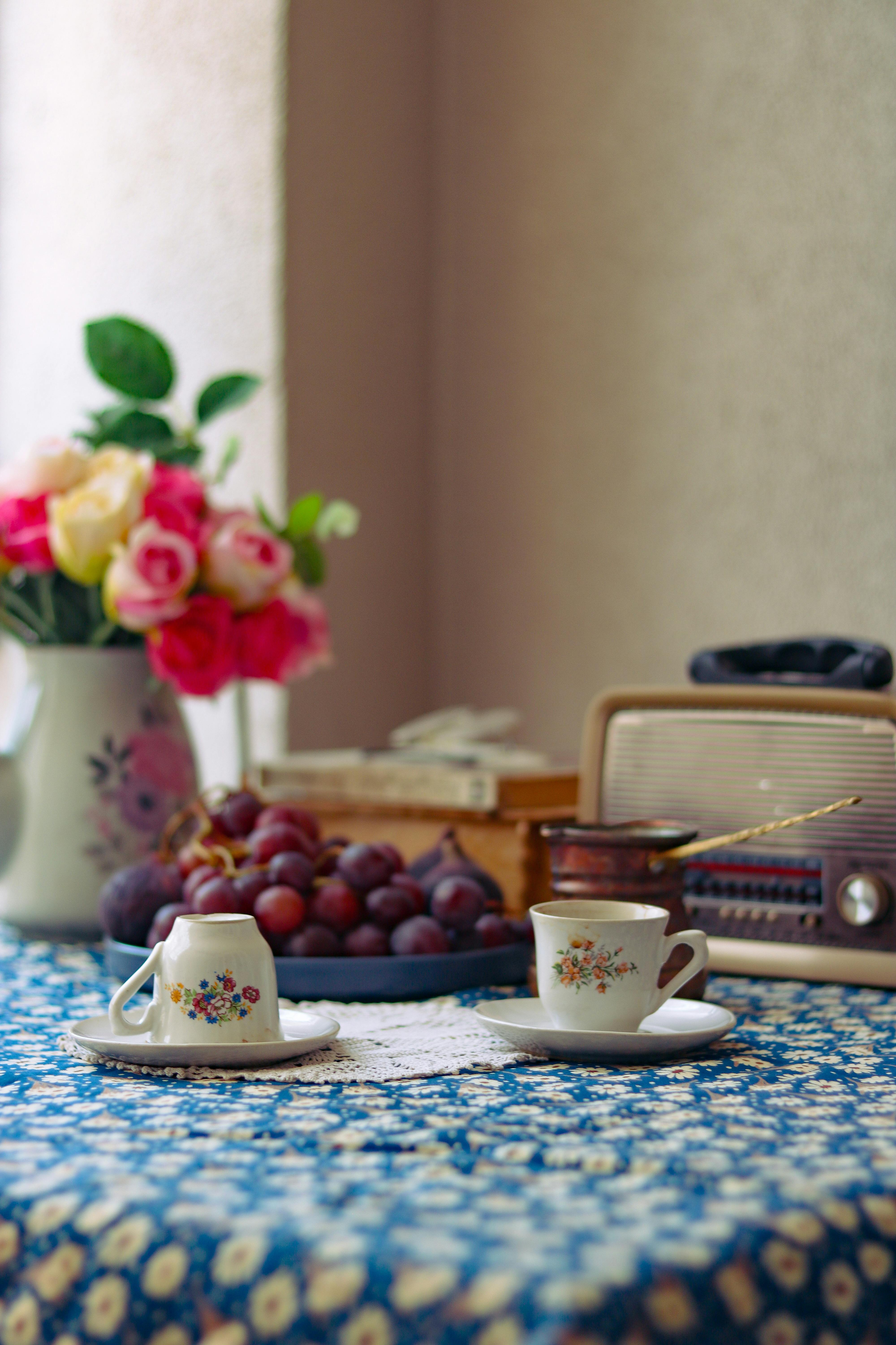 Vintage Tea Setting with Grapes and Radio · Free Stock Photo