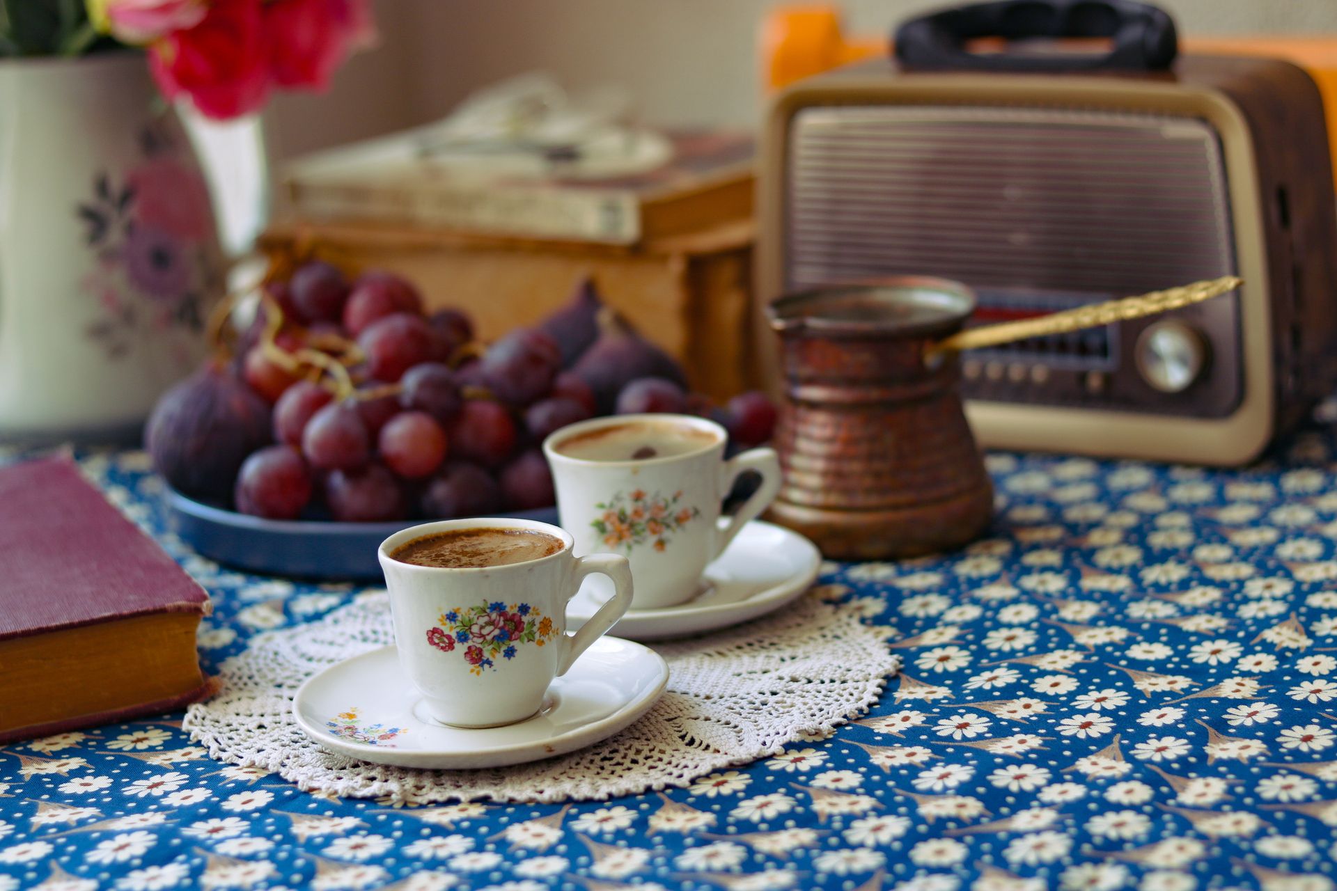 Cozy Vintage Coffee Setup with Flowers and Radio