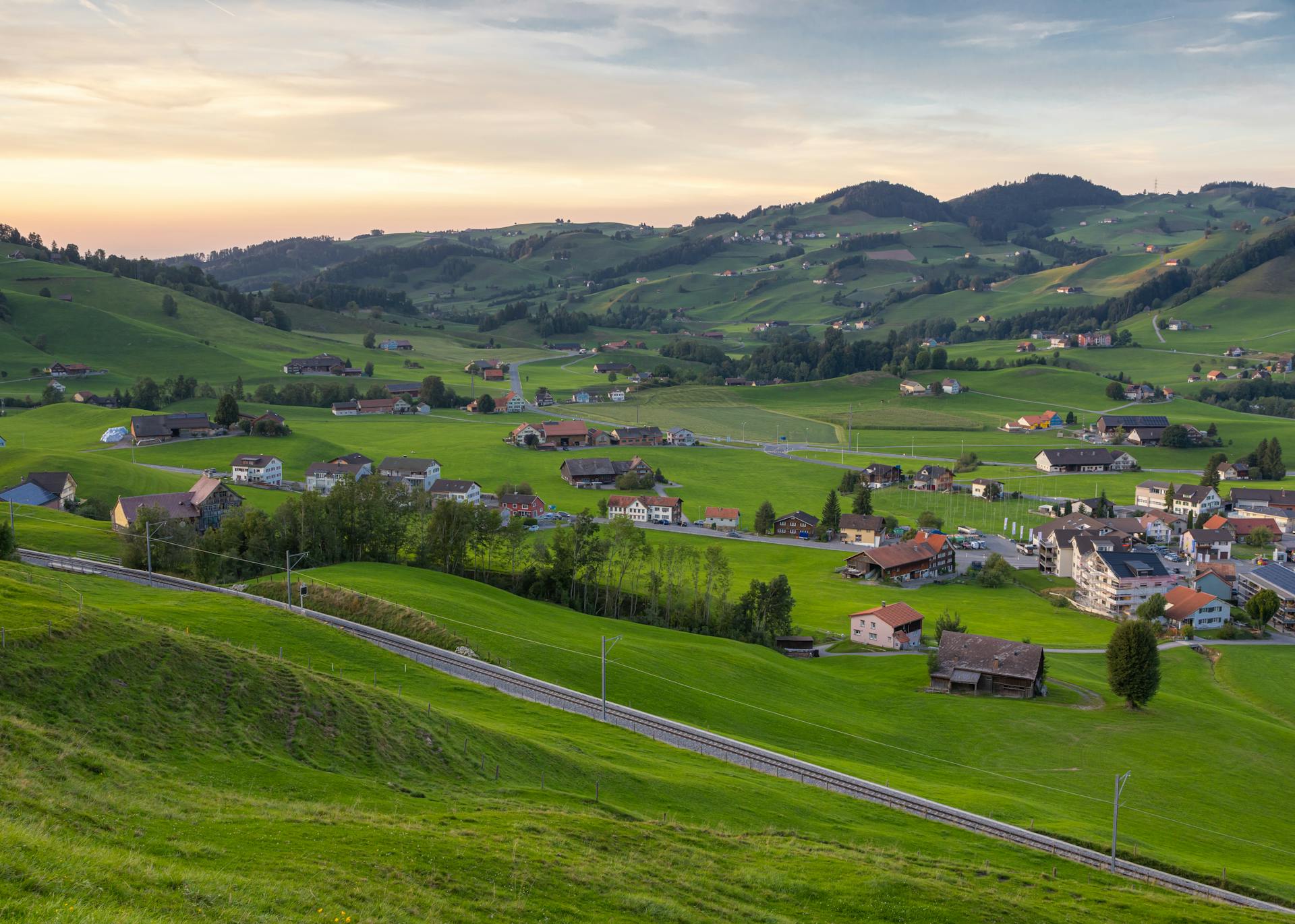 Scenic Aerial View of Swiss Countryside at Dusk