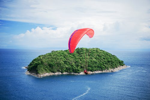 Person Riding Parachute