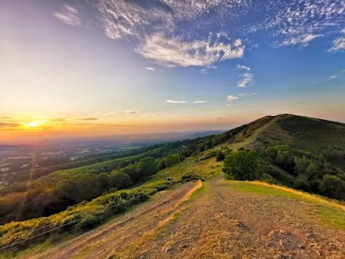 Free Scenic View Of Mountains During Sunrise Stock Photo