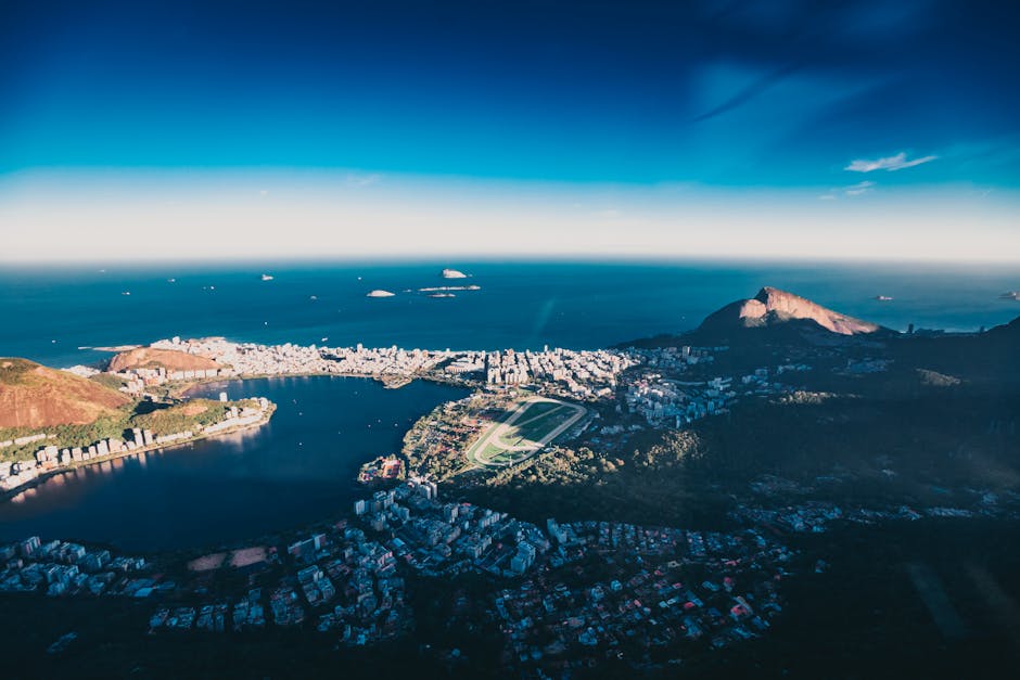 Breathtaking aerial view of Rio de Janeiro showcasing ocean, mountains, and cityscape.