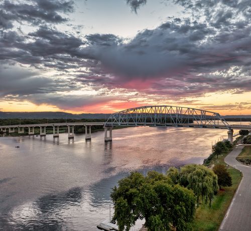Free A stunning sunset over a bridge spanning the Mississippi River in Wabasha, MN. Stock Photo