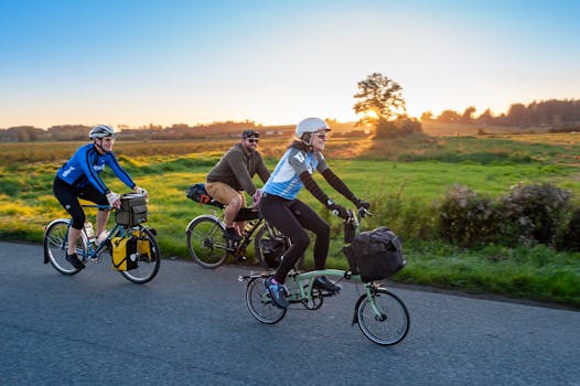 Cyclists enjoy a scenic ride through Saanichton's countryside at sunset.