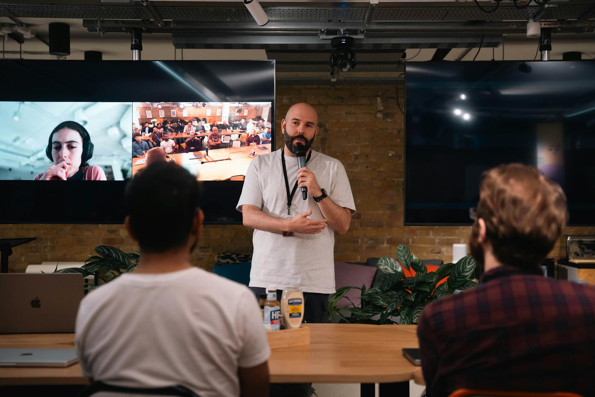 Speaker Presenting at a Tech Conference