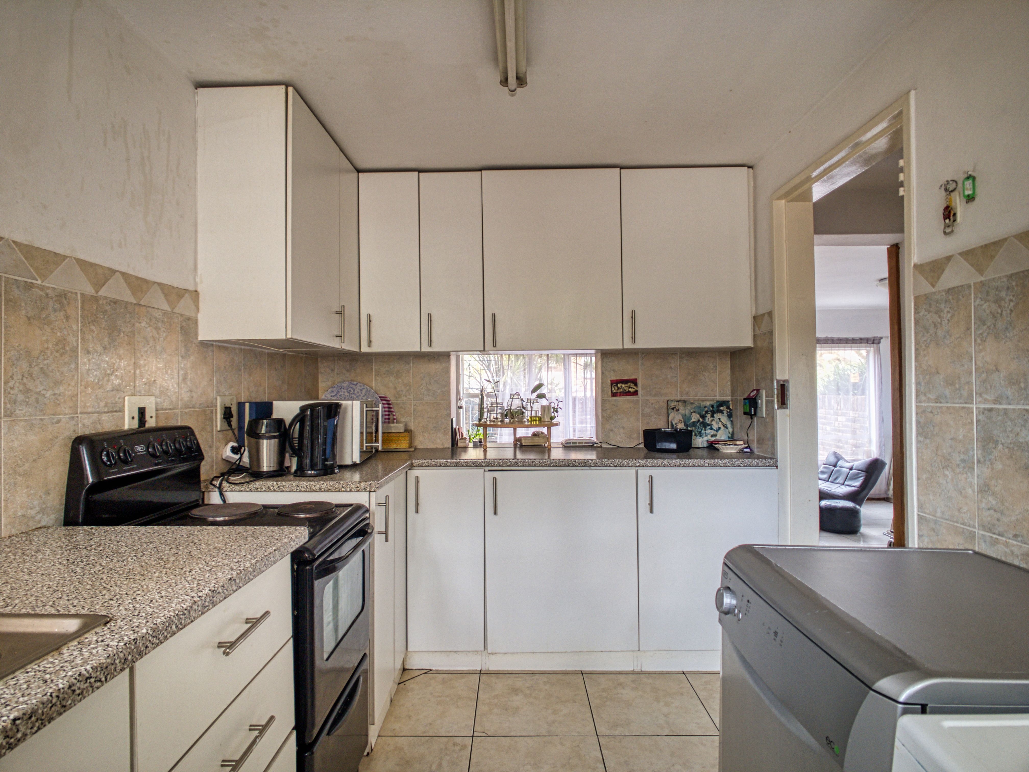 Modern kitchen with warm neutral finishes