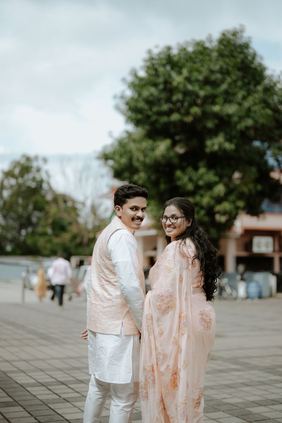 Wedding photography — joyful couple in traditional attire