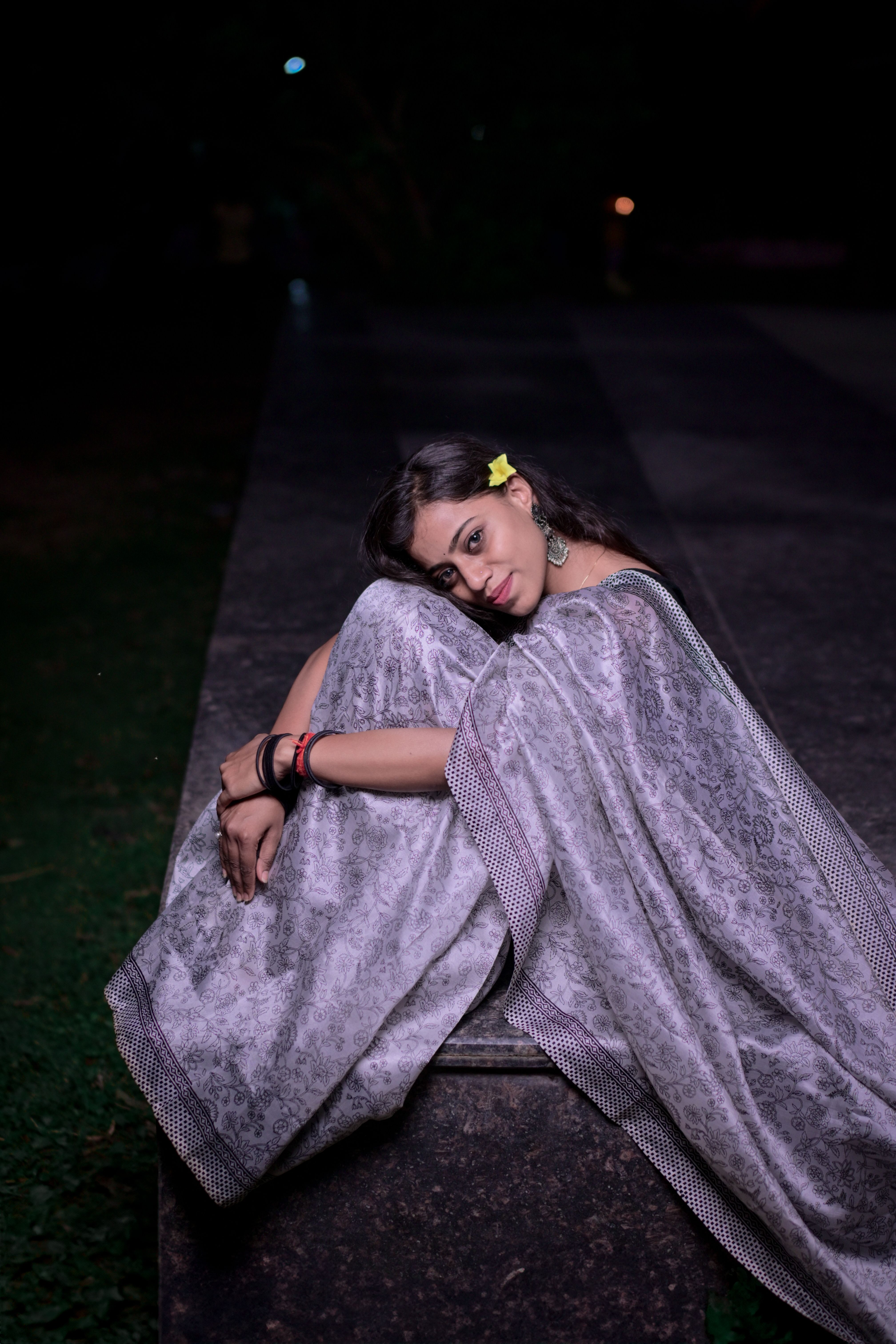 Elegant Indian Woman Posing Outdoors at Night · Free Stock Photo