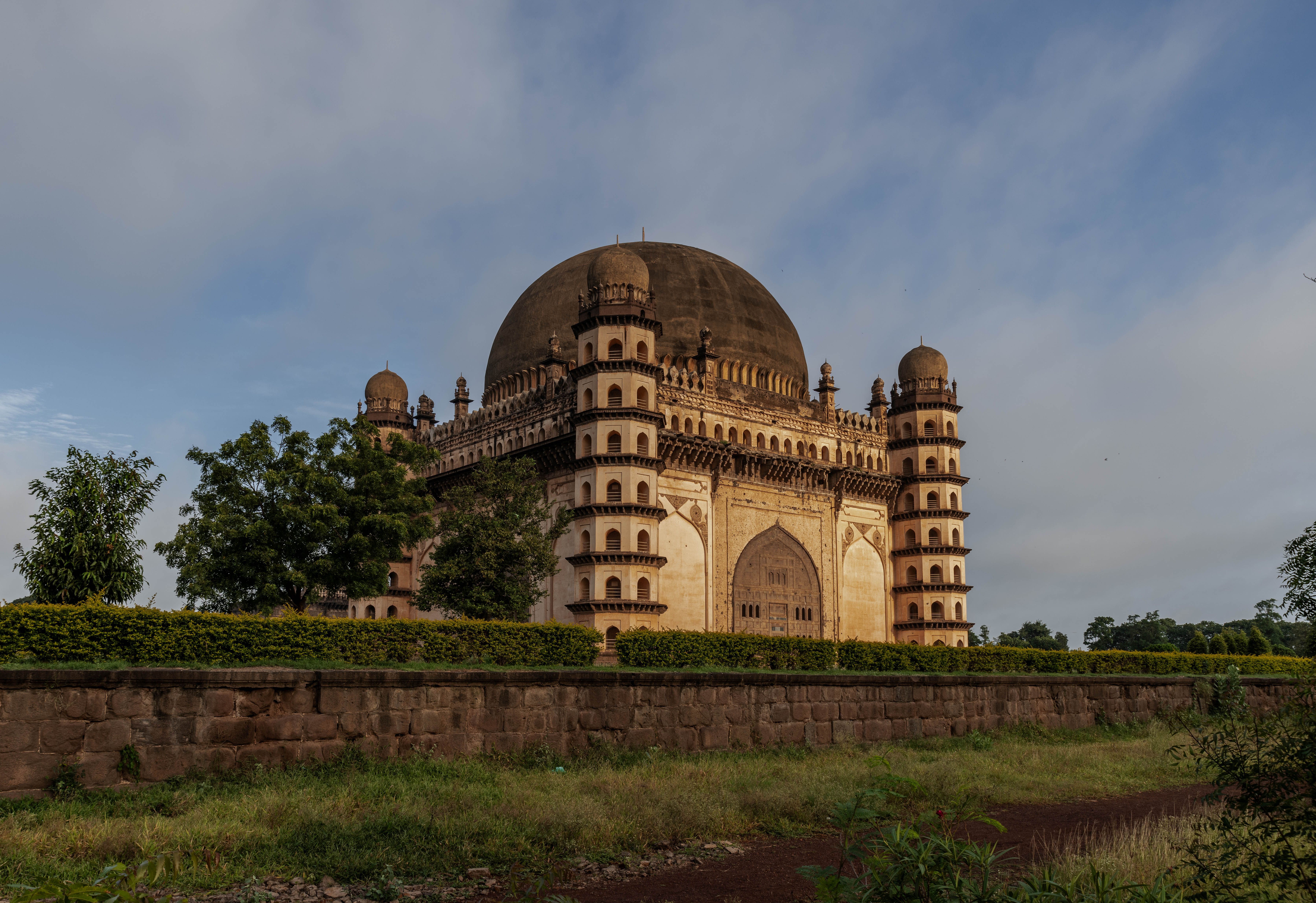 Stunning view of Gol Gumbaz in Bijapur, India, showcasing its grand architecture at dawn. - Mechuka