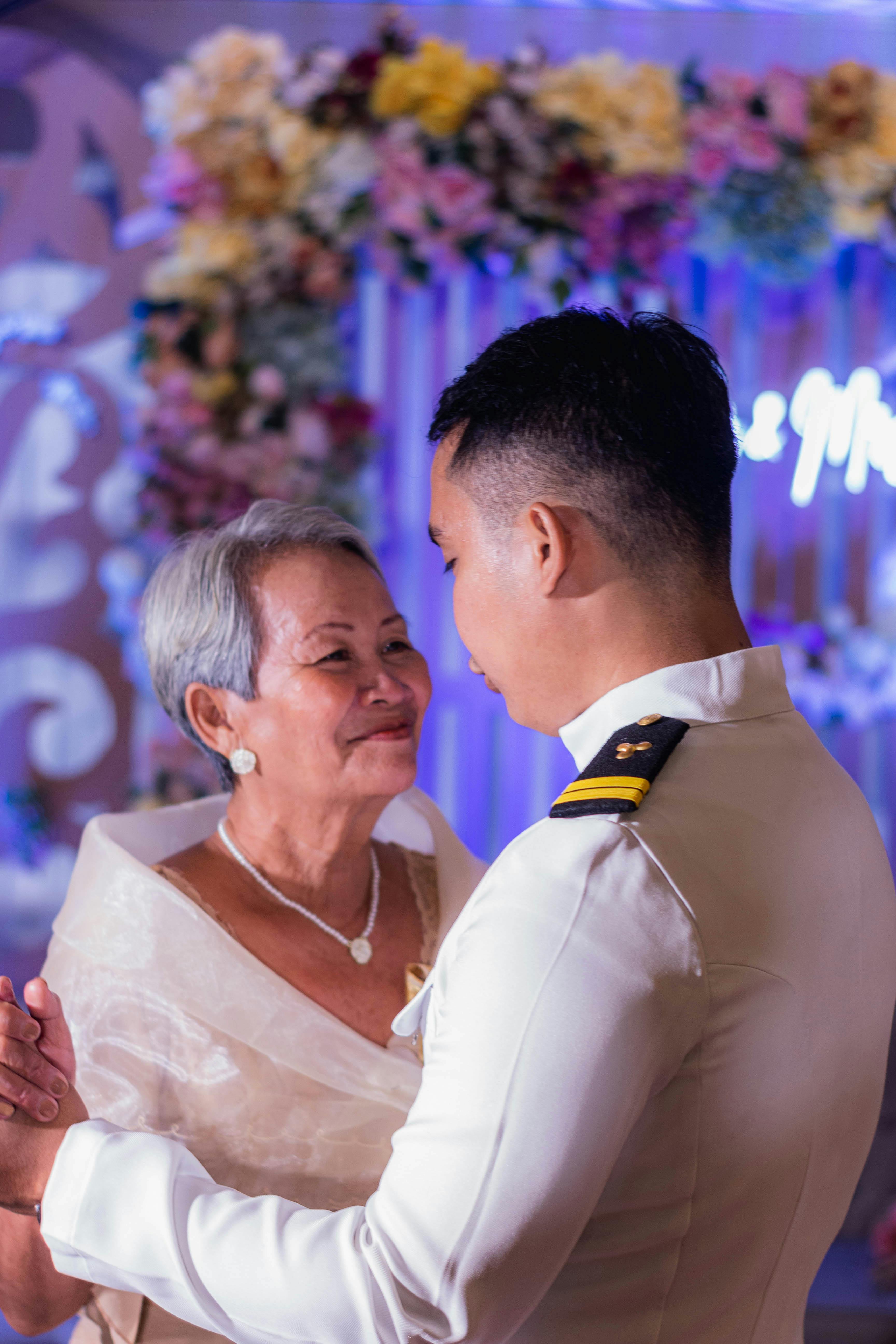 heartwarming dance between elderly woman and navy officer