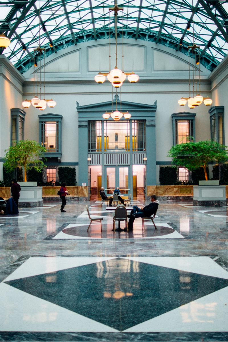 A hotel lobby interior with considered lighting and finishes