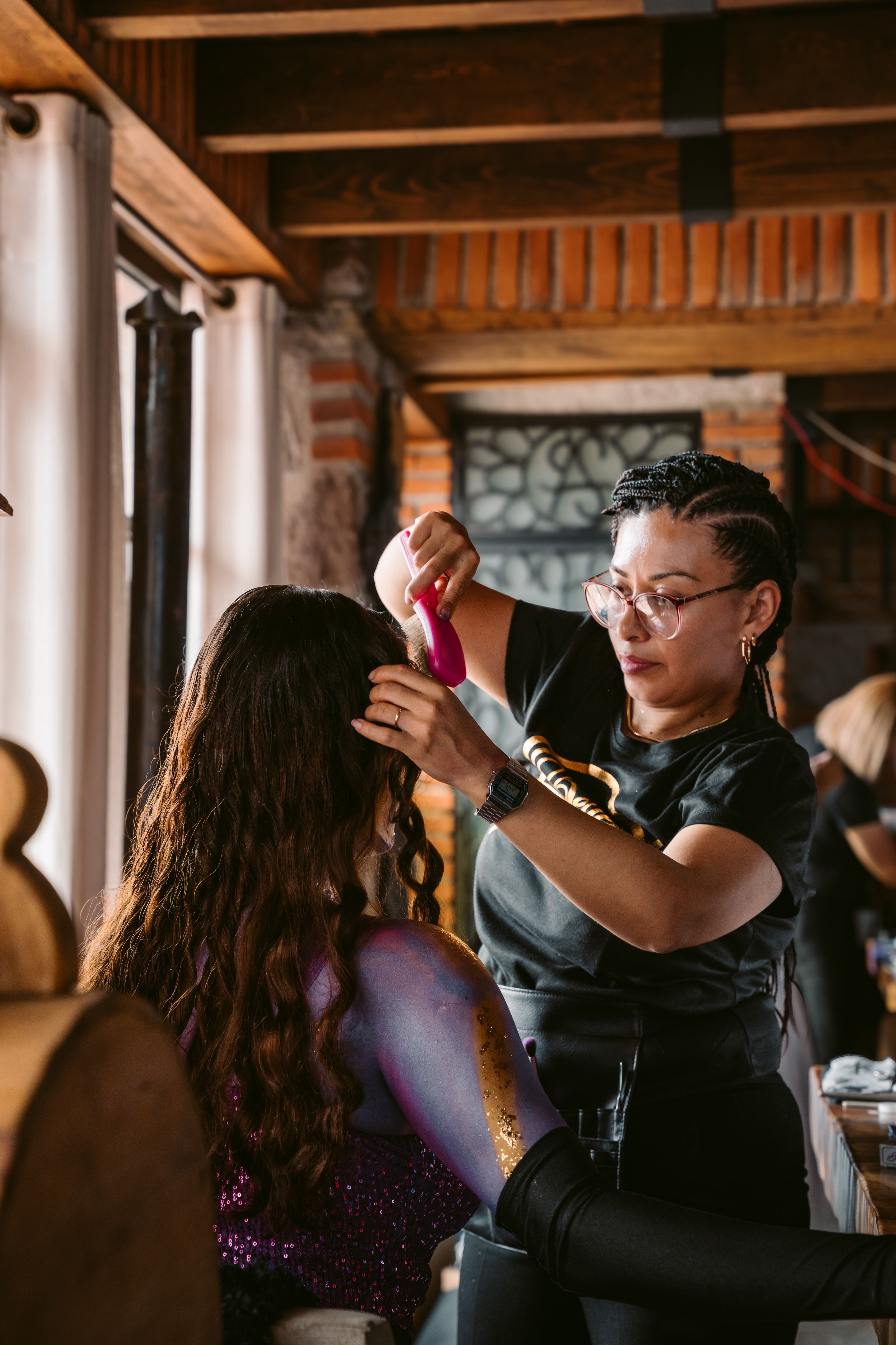 Professional Stylist Prepping Model for Photoshoot · Free Stock Photo