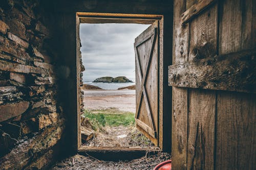 Free Brown Wooden Opened Door Shed Stock Photo