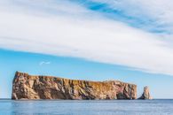 Photo of Rock Formation in the Middle of Body of Water