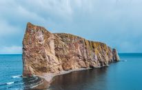 Photo of Rock Cliff in the Middle of Body of Water
