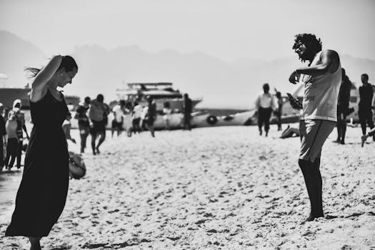 A carefree couple enjoys the beach in Hurghada, Egypt. by Lian Rodriguez