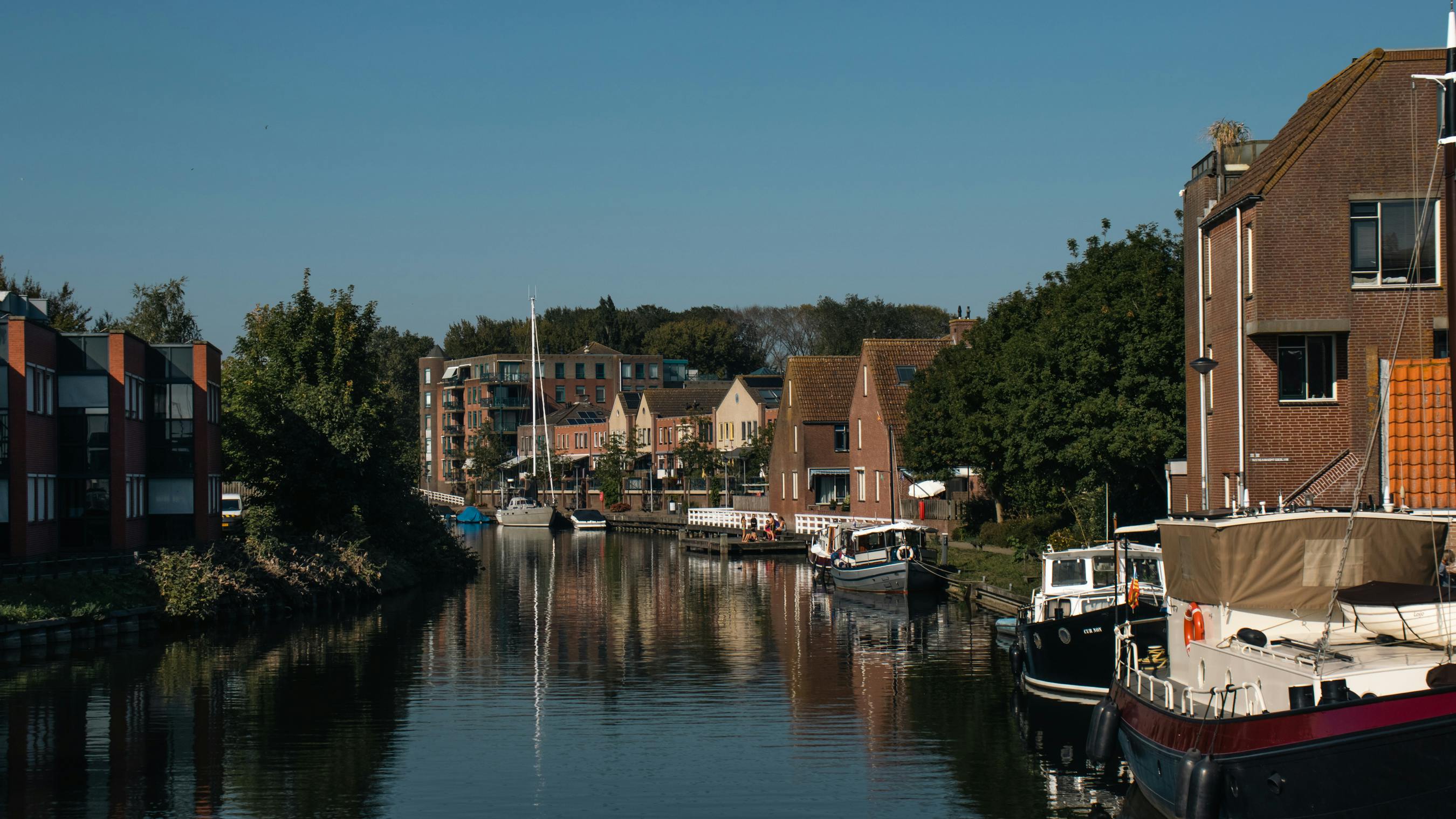 scenic amsterdam canal with traditional architecture