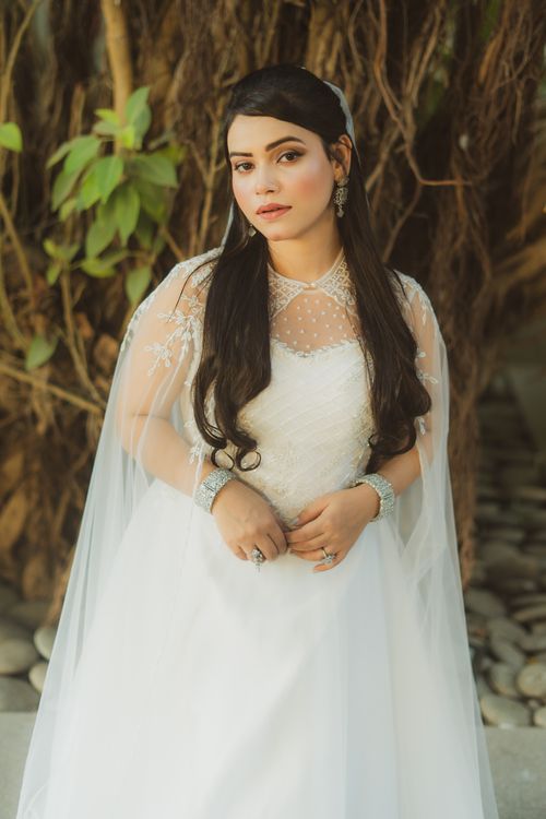 Free A stunning South Asian bride in an elegant wedding dress, showcasing traditional bridal fashion. Stock Photo