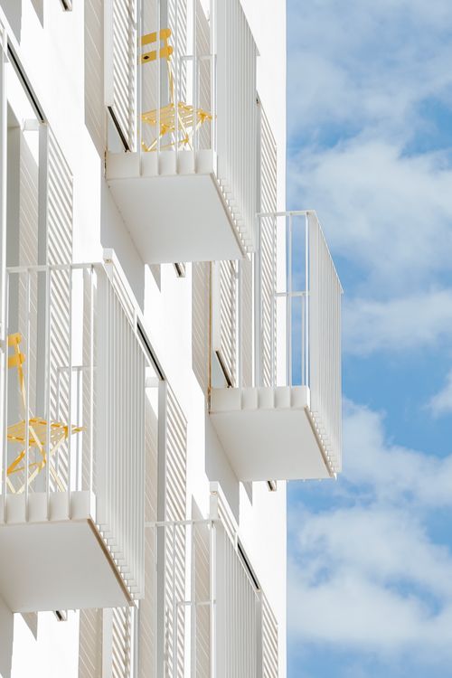Modern Apartment Balconies with Outdoor Furniture · Free Stock Photo