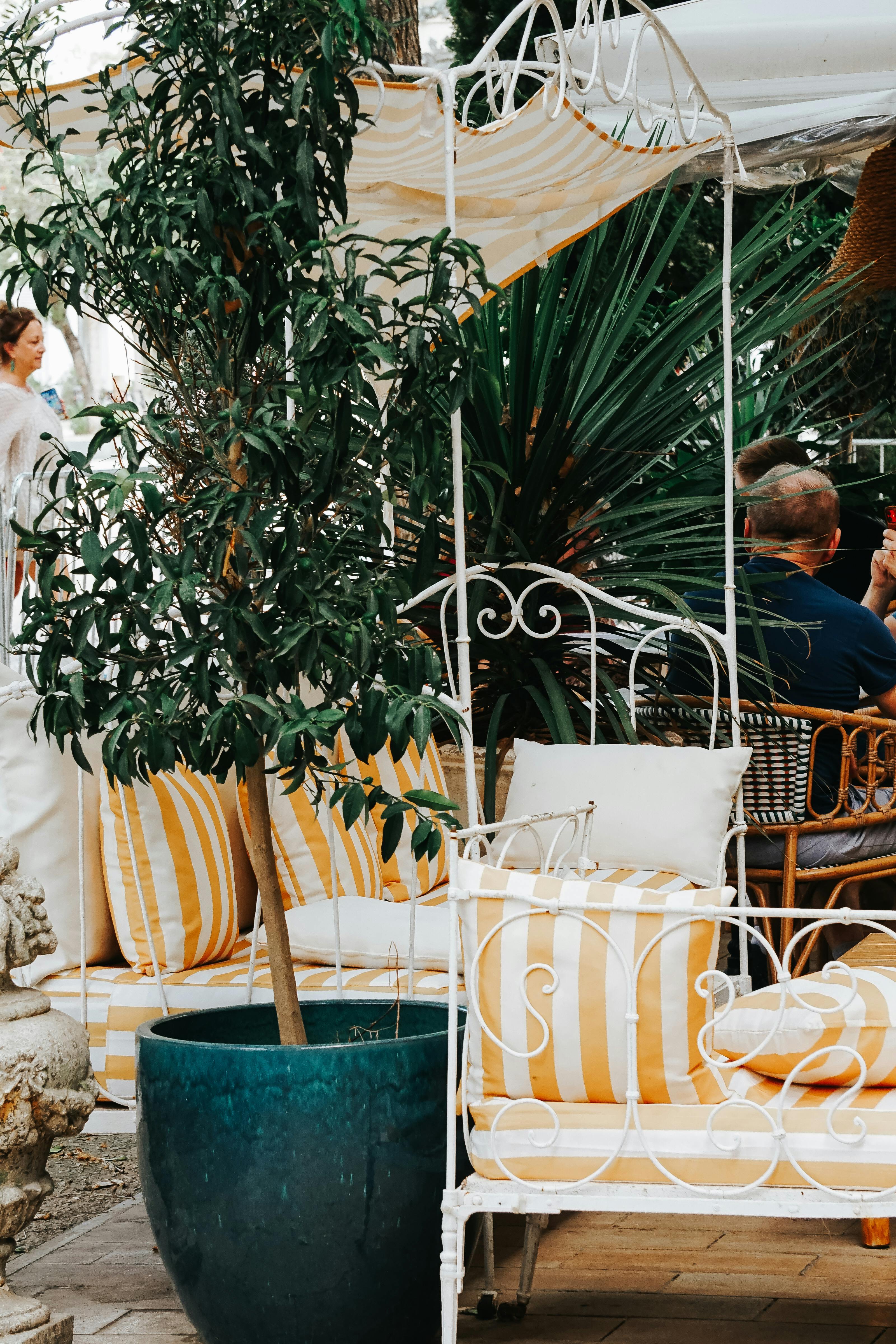 Chic outdoor lounge with vibrant decor for golden hour