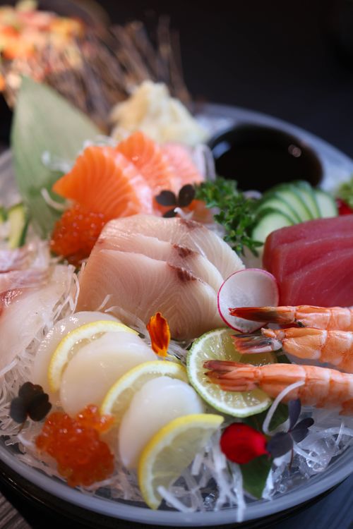 Free A vibrant and fresh sashimi platter featuring assorted seafood, perfect for culinary exploration. Stock Photo