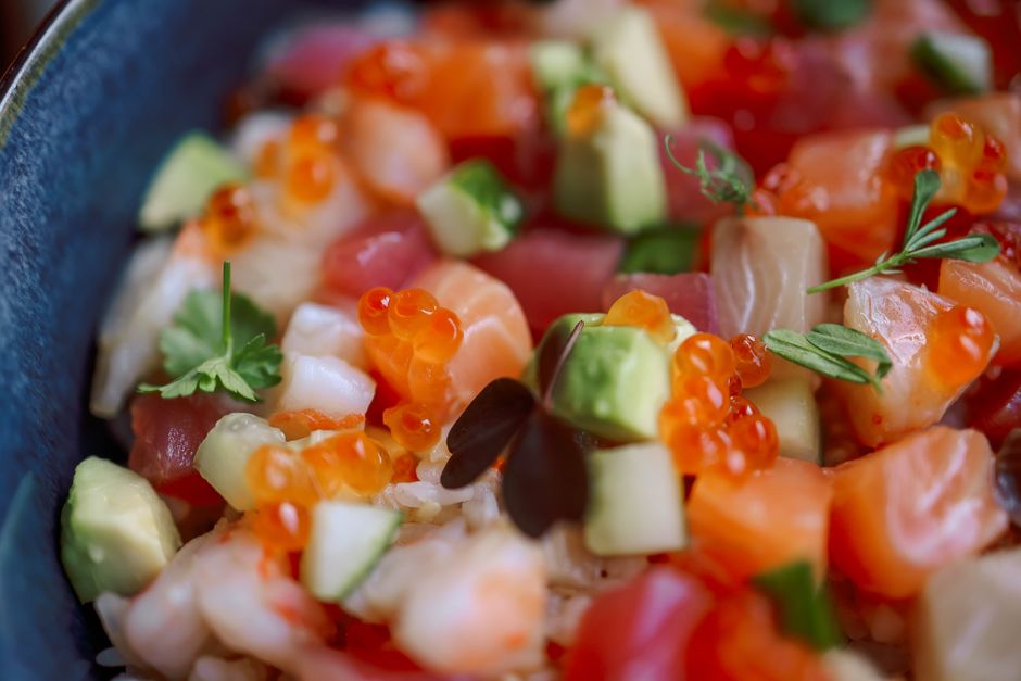 salmon rice bowl with avocado and cucumber